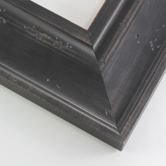 This natural-wash wood frame features a black varnish that does not disguise the rich wood grain.  Antiquing is created by nicks that add character and depth to the subtlety bevelled face.

3 " width: ideal for large or oversize images.  Border a rustic greyscale or nature photograph, or autumnal painting or print with this simple, bucolic frame.