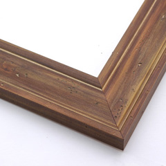 This natural-wash wood frame features a soft brown varnish that highlights the rich wood grain.  Antiquing is created by nicks that add character and depth to the subtlety bevelled face.

2 " width: ideal for medium size images.  Border a rustic nature photograph, or autumnal painting or print with this simple, bucolic frame.