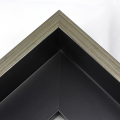 This Large, L-shaped floating contemporary canvas frame in matte black features a thin brushed silver face.

*Note: These solid wood, custom canvas floaters are for stretched canvas prints and paintings, and raised wood panels.