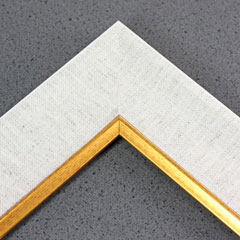 Linen liners are a great option for providing white space between art and frame.  Where glass is generally required to protect paper artwork and its mat, a linen liner does not require glass, making it perfect for paintings and Giclée prints.

This 2 " wheat/oatmeal liner has an authentic linen texture and a bevelled antique gold lip.  It is ideal for small, medium or large  canvas prints, watercolours or oil paintings.