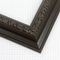 The 2 " Reverse with Compo Panel in Black features a deep, traditional profile with ornate embossed detailing that adds richness and dimension to artwork or photography. Its dark black finish and classic decorative edge create a refined presentation suited for both contemporary and traditional displays.

2 " width: ideal for medium- to large-size images. The detailed nature of this frame makes it suitable for bright or busy paintings or photographs. It may overpower simpler images.