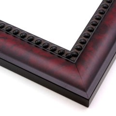 This solid wood frame features a subtly curving profile and beaded inner lip.  The curved face has a mahogany wash mottled with black, and fades to black at the outer edge.  

2 " width: ideal for medium size artwork. Draw the eye to a favourite photograph, or highlight an oil painting or Giclée print.