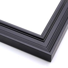 This matte black, ornately ridged crown moulding frame features a steep outer edge that cascades in curved steps into a flat valley.  The inner lip rises again in a gentle, bevelled curve.

1.7 " width: ideal for medium size artworks.  Select a bold painting or giclee print that can compete with this busy frame, or a strong photograph for a more modern take on this classic style.