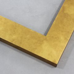 This high shine, satin gold foil frame features a flat 2 " profile. A brushed finish reveals subtle distressing giving an antique look. The final effect is simple, yet glamorous.