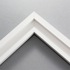This simplistic yet modular white frame is designed for metal prints, acrylic prints and dry mounts. This smart design features a minimalist stepped profile that serves as a floater frame or a standard picture frame.

For the floating effect, the print can be attached on top of the inner step of the frame, without sacrificing the artwork edges.

This frame can also be used as standard picture frame. The lowered center paired with slightly raised outer lip creates a frame within a frame effect. However, due to the inner most lip of the frame, a fraction of the artwork will be hidden. But, this can be avoided with a linen liner combo.
