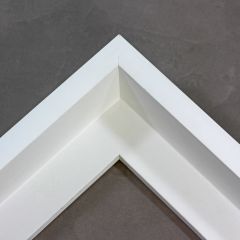 This elegant L-shaped canvas floater frame features a clean, contemporary profile finished in crisp white. The smooth finish and sharp angled edges create a modern gallery-style presentation, while the narrow face width offers a sleek, minimalist look.

Display your favourite gallery wrapped Giclée print or painting with authentic, fine art style. These canvas floating frames are ideal for medium and large images.

*Note: These solid wood, custom canvas floaters are for stretched canvas prints and paintings, and raised wood panels.