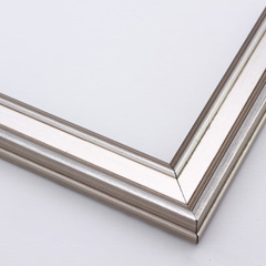 This narrow frame features a crown moulding profile finished in silver leaf.  An antique look is achieved with a gentle brushed effect that highlights the corners of the bevelled edges.

1.25 " width: ideal for small- to medium-size images.  Border a black-dominant grayscale photograph or acrylic painting with this stylishly simple frame.