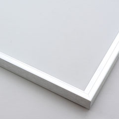 This metal picture frame has a silver, high-shine finish, brush-textured drop edge and a curved profile. The classic flat face makes this frame ideal for almost any small or medium-size artwork. 

.3 " width. Easily frame photographs, paintings or drawings on paper, or even Giclée canvas prints.
