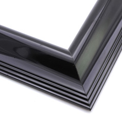 This simple, reverse scoop frame features a bevelled outer edge smoothly curving inner lip.  The high shine of the black results in a unique, modern flare.

2.5 " width: ideal for medium or large images. Pair with a contemporary painting or Giclée print, or a bold, greyscale photograph.