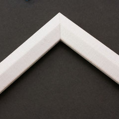 Linen liners are a great option for providing white space between art and frame.  Where glass is generally required to protect paper artworks and their mat, a linen liner does not require glass, making it ideal for paintings and Giclée prints.

This 1 " white liner has an authentic, soft linen texture and flat face with a sloped inner lip.  It is best suited to small and medium size canvas prints and oil paintings.