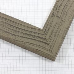 This flat grey frame features a natural wood grain texture using smooth ripples. The aged appearance of the frame has a brown wood like colouring peeking out under the grey wash. This frame uses both colour and texture to create a rustic barnwood effect.