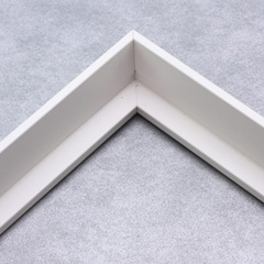 This simple, tapered edge canvas floater frame features a narrow face with a drop edge that widens internally toward the base.  This style, in a classic matte white, lends a unique hovering effect to your framed canvas. 

Display your favourite gallery wrapped Giclée print or painting with authentic, fine art style. These slender canvas floating frames are ideal for smaller, .75 " deep (thin) stretched canvases.

*Note: These solid wood, custom canvas floaters are for stretched canvas prints and paintings, and raised wood panels.