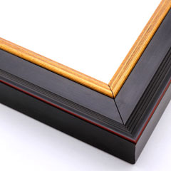 This steep-edged, stepped crown moulding frame features a matte antique black finish delineated by a thin red outer corner.  The inside lip contrasts with a bold gold foil. The unique 1.5 " outside depth gives this frame a deep, majestic appearance.

2.125 " width: ideal for medium and large images. Give a family photo a royal air, or border an elegant oil painting or print with this frame.