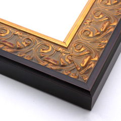 An ornate, solid wood frame featuring an intricate design overlaid with elegant gold leaf, and lightly antiqued.  A shallow scooped profile and unadorned inner edge draw the eye inward. A dark brown outer edge highlights the design.  

2.75 " width: ideal for large and extra large (oversize) artworks.  Oil paintings, prints and formal family photos will be equally at home encased in this traditional frame.