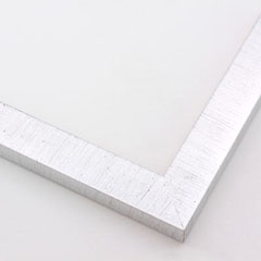 This high shine, silver foil frame features a flat, slim profile.  A brushed finish reveals subtle lines and faint black spattering gives an antique look.  The final effect is simple, yet glamorous.

1 " width: ideal for small- to medium-size images.  Suited to oil or watercolour paintings, prints, and abstract or nature photographs.