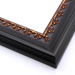 This solid wood frame features a matte black crown moulding profile.  At the inner edge of the deeply scooped face, the delicate design is brushed with bronze for an antique look that suits old paintings, prints and family photographs alike.

2.5 " width and 1 " high at outer edge: ideal for medium- to large-size images.