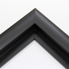 This simple, matte black frame features a thick curved profile.  The slope of the face makes this a simple but glamorous selection. A 1 " rabbet gives this frame a narrow shadow-box quality.

Ideal for medium-sized and large images.  Select an oil or watercolour painting, print, or grayscale photograph.