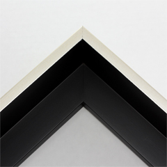 This extra tall, L-shaped floating contemporary canvas floater frame in warm silver features a thin flat face.

*Note: These solid wood, custom canvas floaters are for stretched canvas prints and paintings, and raised wood panels.