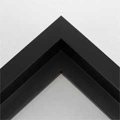 This large, L-shaped floating contemporary canvas frame in matte black features a wide flat face.

*Note: These solid wood, custom canvas floaters are for stretched canvas prints and paintings, and raised wood panels.