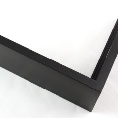 This slim 3/8 " contemporary metal shadow box frame is the epitome of modern sophistication. This frame is designed to elevate your artwork or cherished mementos with its sleek and streamlined silhouette featuring a 1-5/8 " depth. The solid matte black finish adds a touch of boldness and elegance, making it a perfect complement to any décor style.

With a frosted texture covering all sides, this frame exudes an air of subtlety and refinement. The frosted texture adds a unique dimension to your displayed items, creating a captivating visual effect that draws attention in the most sophisticated manner.

Thanks to its thoughtfully designed construction, this shadow box frame reflects very little light, ensuring that your showcased content remains the center of attention without any unwanted glares or distractions. Embrace the contemporary allure of this metal shadow box frame, and let your treasured pieces shine in a display that exudes both style and artistic grace.

Nielsen n100-21 Profile
