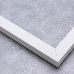This matte white frame features a slim, smooth face. Dress it up with an old watercolour or oil painting, or keep it modern with a family photograph. 

.875 "es wide: ideal for small images.