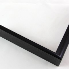 Slim 5/16 " metal frame. This frame comes in solid mars black. The face has a smooth, mirror texture and reflects sharp light. The profile features a horizontal brushed texture.

Nielsen n22-20 Profile
Anodic/Semi-Gloss  Black
