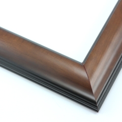 This simple, reverse curve frame features a walnut-wash, natural wood grain.  The subtly bevelled inner and outer edges are matte black.

1.75 " width: ideal for small or medium size images.  The plain, natural appearance of this frame makes it a great border for almost any artwork: photograph, painting or giclee print.