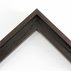 This stair step wood floater frame lets your canvas hover neatly within the simple, modern border. The frame features a Espresso Natural Wood finish with a steep upper and small lower step.  
Give an authentic, fine art display to your favourite Giclée print or oil painting. This size is ideal for thin (3/4 " deep) gallery wrap canvases. The canvas may protrude slightly above the frame face. 

*Note: These solid wood, custom canvas floaters are for stretched canvas prints and paintings, and raised wood panels.
