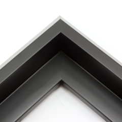 This unique floater frame for stretched canvas features a narrow, 0.5 " face that falls into a steep reverse slant toward the outer edge of the frame.  The modern style is finished in matte black.

Ideal for mounting medium to extra large, thick (1.5 " deep) gallery wrapped canvas portraits, paintings or Giclée prints. The canvas will extend slightly farther than the face of the frame. 

*Note: These solid wood, custom canvas floaters are for stretched canvas prints and paintings, and raised wood panels.