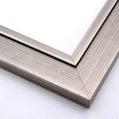 This bold silver foil frame features a slanted face with a raised inner lip.  Gentle brushing creates an antique look, making this frame a classic, versatile choice.

2 "es wide: ideal for large images.  Embrace this frame