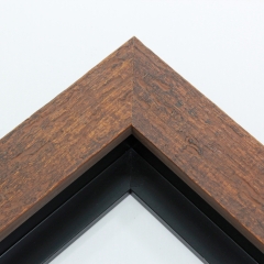 This simple but expressive floater frame features an organic wood grain face, complete with whorls and shallow ridges. The rich, matte walnut finish highlights the natural texture.

1.75" width: ideal for medium size artworks. The natural simplicity of this countryside frame is the perfect match for nature or farmland photographs or oil paintings.