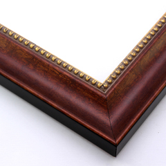 A simple, scooped profile wood frame that adds an elegant touch to your favourite photographs or artwork prints.  The deep sienna brown base overlaid with a similar brown-gold creates a subtle marbled effect that meets an inner edge of gold foil-tipped beading and a gold foil drop edge. The sides of the frame are black.

2 " width: ideal for medium-size artworks.