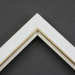 Linen liners are a great option for providing white space between art and frame.  Where glass is generally required to protect paper artworks and their mat, a linen liner does not require glass, making it ideal for paintings and Giclée prints.

This 1.25 " white liner has an authentic, soft linen texture and a gold and painted white lip.  It is best suited to small and medium size canvas prints, watercolour or oil paintings.