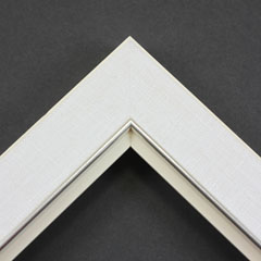 Linen liners are a great option for providing white space between art and frame.  Where glass is generally required to protect paper artworks and their mat, a linen liner does not require glass, making it ideal for paintings and Giclée prints.

This 1.75 " white liner has an authentic, soft linen texture and a silver and painted white lip.  It is best suited to medium size canvas prints, watercolour or oil paintings.