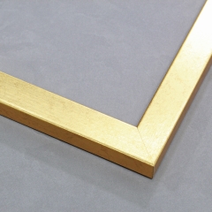This simple, high-sheen frame features a smooth face of cracked, gold foil finish. It achieves a delicate, modern take on a basic style.

1 " width: ideal for small images.  Border a bold photograph, or acrylic painting or print in this subtle, contemporary frame.