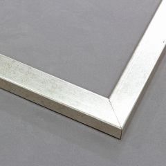This simple, high-sheen frame features a smooth face of gold-brushed, silver foil finish. It is a delicate, modern take on a basic style.

1 " width: ideal for small images.  Border a bold greyscale photograph or acrylic painting or print in this subtle, contemporary frame.