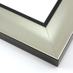 This simple, bold frame features scoop profile and silver foil face.  The inner lip is stepped down and painted a matte black, to match the outer drop edge.

2.75 " width: ideal for large and extra large artworks. Due to it