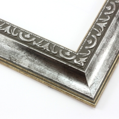 This classic, Victorian-style frame features a solid wood, reverse scoop profile.  The relief-detailed inner lip and sloped face are a textured silver foil, edged in a subtle bevel.

2 " width: ideal for medium size images. Border an acrylic or oil painting or print with this antiqued, high fashion frame.