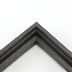 This stair step floating canvas frame in matte black with a natural wood grain texture features a shallow recessed stair below the outer face. The canvas will hover neatly, resting on the lowest, flat edge.  

Give an authentic, fine art display to your favourite canvas Giclée print or acrylic painting. This canvas floating frame is ideal for medium and large images stretched on thin (3/4 " deep) stretcher bars.

*Note: These solid wood, custom canvas floaters are for stretched canvas prints and paintings, and raised wood panels.