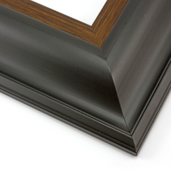 This wide, reverse scoop frame features a matte black face and bevelled outer edge. The stepped inner lip is brushed with a subtle bronze foil.

3.5 " width: ideal for oversize images. Bright acrylic and oil paintings or their giclee prints will shine in this classic frame.