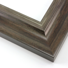 This elegant frame has a double scoop profile.  The outer, wider scoop brings out the natural wood in gray-brown. The inner lip features a subtle silver foil finish that maintains the wood grain.

2.5 " width: ideal for large and extra large (oversize) images. Border a bold watercolour or oil painting, or your favourite print, in this stylish, classic frame.