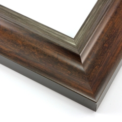 This elegant frame has a double scoop profile.  The outer, wider scoop brings out the natural wood in a deep golden brown. The inner lip features a subtle silver foil finish that maintains the wood grain.

2.5 " width: ideal for large and extra large images. Border a bold watercolour or oil painting, or your favourite Giclée print, in this stylish, classic frame.
