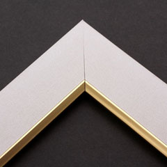 Linen liners are a great option for providing white space between art and frame.  Where glass is generally required to protect paper artwork and its mat, a linen liner does not require glass, making it perfect for paintings and Giclée prints.

This 2 " white liner has an authentic linen texture and a bevelled gold lip.  It is ideal for small, medium or large  canvas prints, watercolours or oil paintings.