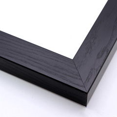 This heavy frame features simple, straight edges and a glossy black finish with wood grain details. 

Protruding 1.25 "es, a distinct division is achieved between art and wall. The deep rabbet also provides shadow box properties.

1.5 " width: ideal for medium size images.  The simple, classic nature of this frame, and it