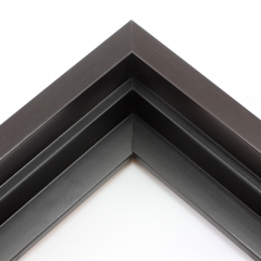 This solid wood canvas floater frame features a dark brown matte finish with wood grain detailing.  

Display your favourite gallery wrapped Giclée print or painting with authentic, fine art style. This floater frame is ideal for medium to extra large canvases mounted on thick (1.5 " deep) stretcher bars.

*Note: These solid wood, custom canvas floaters are for stretched canvas prints and paintings, and raised wood panels.