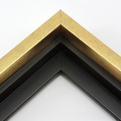 This solid wood canvas floater frame features a glossy brushed gold on the outside edge and topmost face.  The inside step and base are a matte black. 

Display your favourite gallery wrapped Giclée print or painting with authentic, fine art style. This floater frame is ideal for medium to extra large canvases mounted on thick (1.5 " deep) stretcher bars.

*Note: These solid wood, custom canvas floaters are for stretched canvas prints and paintings, and raised wood panels.