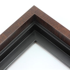 This solid wood canvas floater frame features a glossy deep walnut finish with wood grain detailing on the outside edge and topmost face.  The inside step and base are a matte black. 

Display your favourite gallery wrapped Giclée print or painting with authentic, fine art style. This floater frame is ideal for small to extra large canvases mounted on thick (1.5 " deep) stretcher bars.

*Note: These solid wood, custom canvas floaters are for stretched canvas prints and paintings, and raised wood panels.