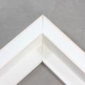 This large, L-shaped canvas floater frame features White w/Red Lines, and a 1-1/8 " flat face.
*Note: These solid wood, custom canvas floaters are for stretched canvas prints and paintings, and raised wood panels.
