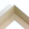 This tall Floater frame features a silver top profile and an inside wedge. The natural wood coloured sides make for a classic style frame to go with any artwork, and the pop of silver on top makes it unique! Tall Floater w/inside Wedge - Silver Top with Natural Color Sides