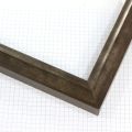 This 1-1/4 " frame features a charcoal and silver finish with textured definition to add depth. This frame is the perfect mix of vintage and class to add elegance to any artwork.